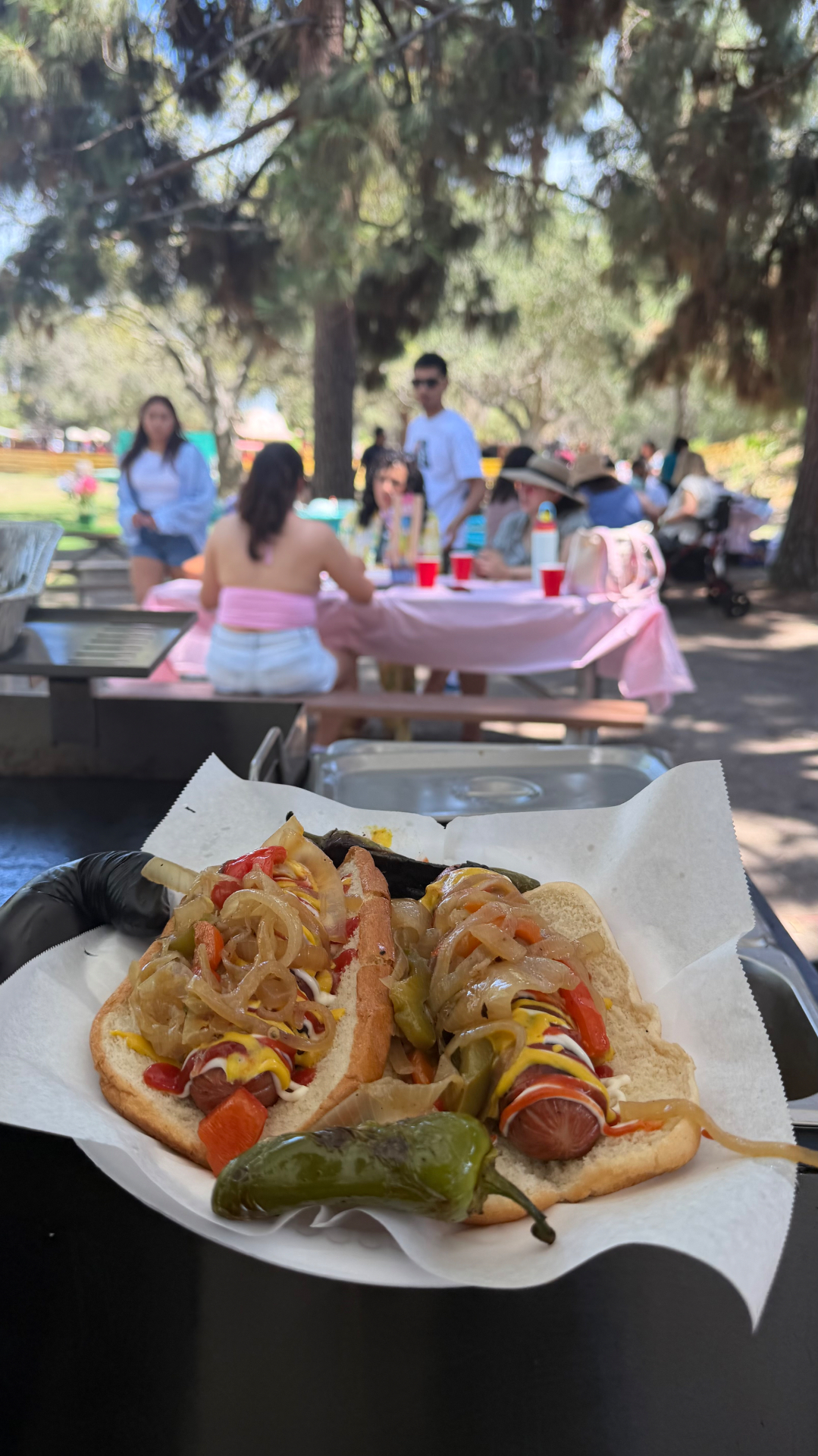 Firme Tacos hot dog catering at an outdoor event