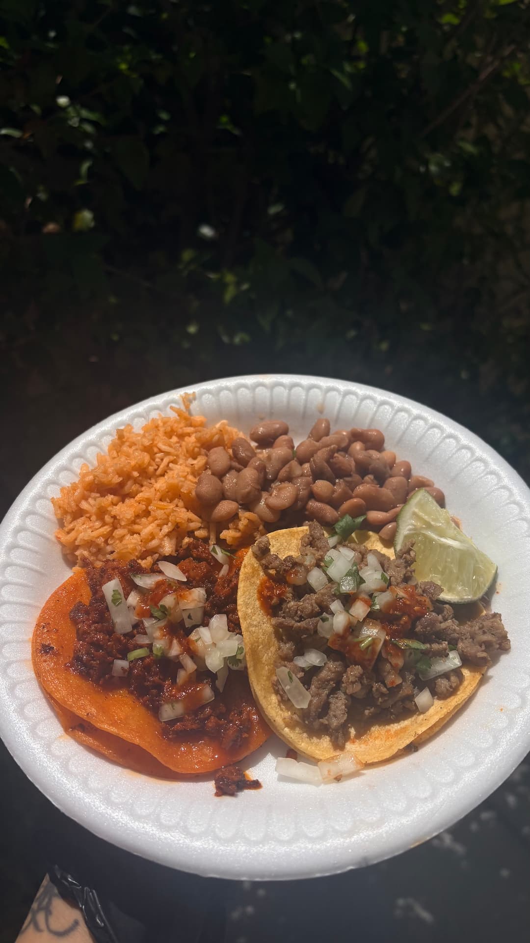 Firme Tacos plate with tacos, rice and beans